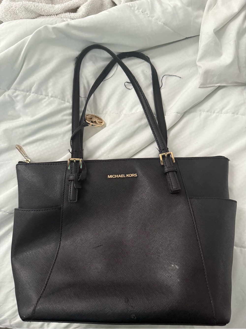 MICHAEL KORS Black Saffiano Tote with Gold Hardware. The straps are messed up